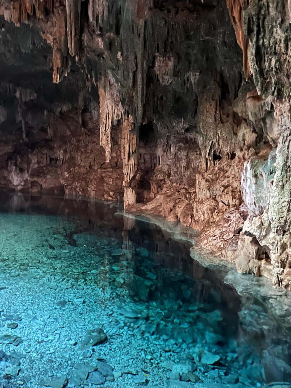 Clear blue water inside a sacred cenote in Yucatán